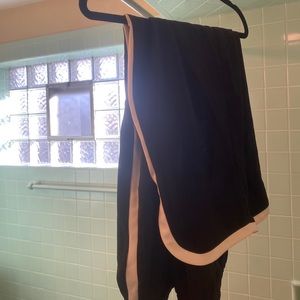 Comfortable black slacks with white ribbon stripe on the side. Size 20